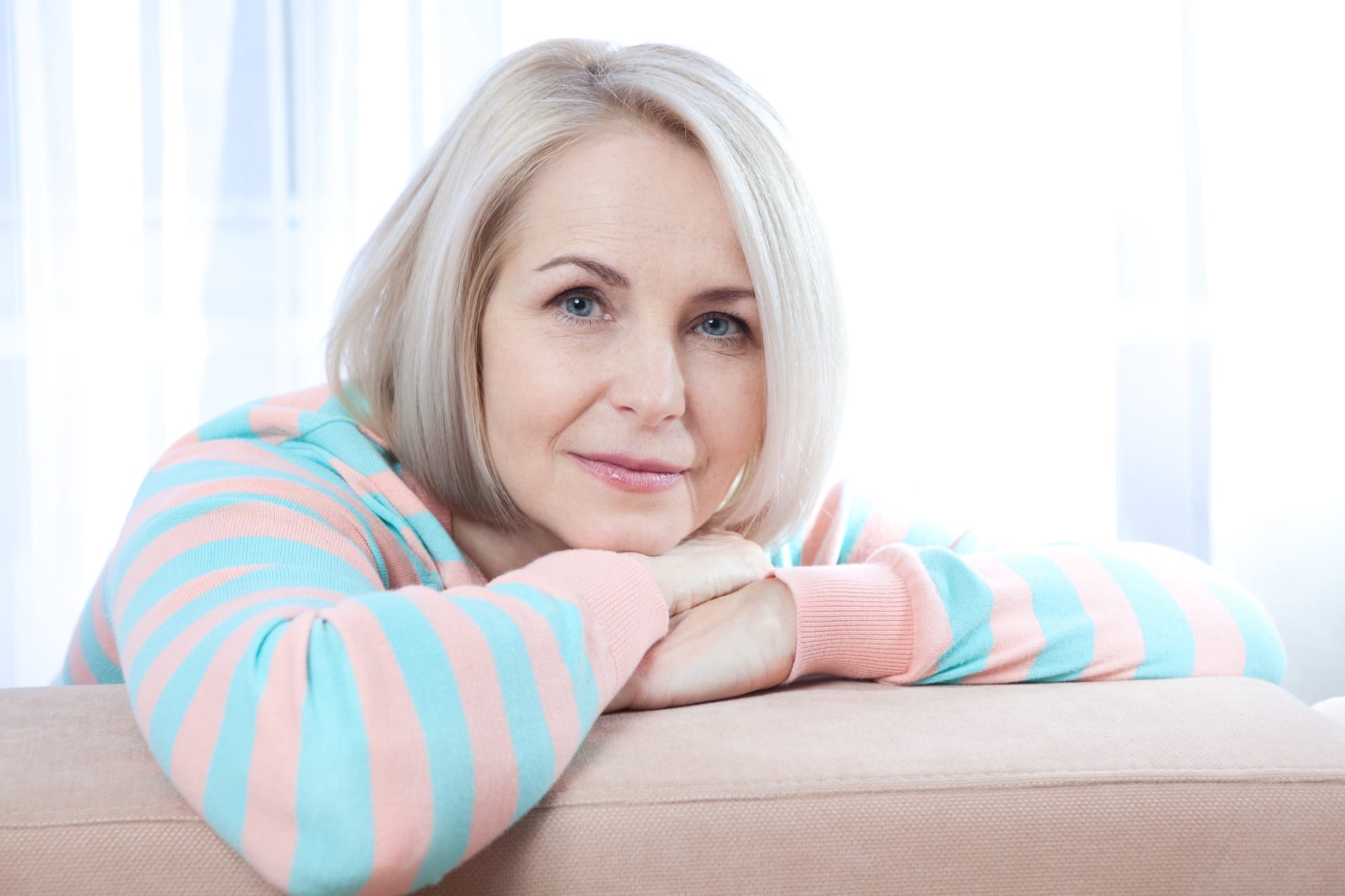 Woman smiling for testimonial