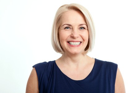 Woman smiling for testimonial