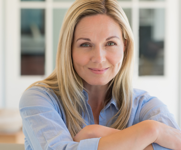 Woman smiling for testimonial